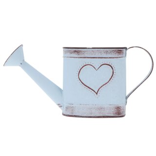 Photo d'un arrosoir vintage simple une anse large et une buse terminée par une tête d'arrosage avec un coeur dessiné le tout sur fond blanc